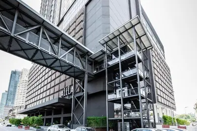 a large building with scaffolding on the side of it at The Establishment KL Sentral Bangsar by Plush in Kuala Lumpur