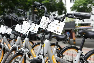 a row of bikes parked next to each other at The Forum Condominium by LaFabrica in Kuala Lumpur