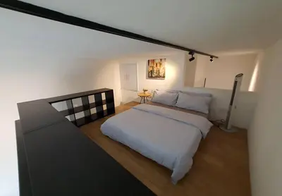 a bedroom with a large bed in a room at KL Sentral, EST Bangsar by SkyLimit Suites in Kuala Lumpur