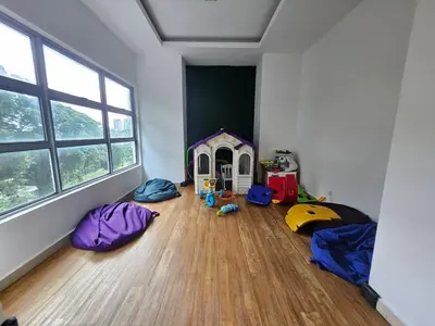 a room with several play tents on the floor at 3 Bedroom Cozy apartmet in Kuala Lumpur