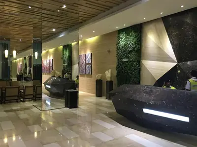 a lobby with a large black tub in a building at M CITY Kl City in Kuala Lumpur
