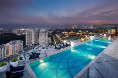 a swimming pool on the roof of a building at Dorsett Hartamas Kuala Lumpur in Kuala Lumpur