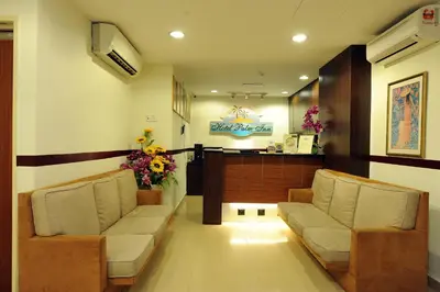 a waiting room with two couches in a hospital at Palm Inn Ampang Point in Ampang