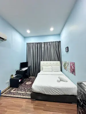 a bedroom with a white bed and a desk at Taragon Service Apartment- Next To LaLaport BBCC in Kuala Lumpur