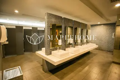 a bathroom with sinks and a sign that says vaunted at SG Residence Kuala Lumpur in Kuala Lumpur