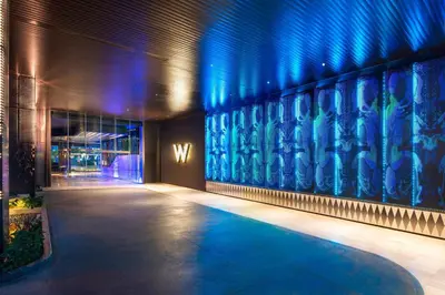 a lobby of a building with blue lights at W Kuala Lumpur in Kuala Lumpur