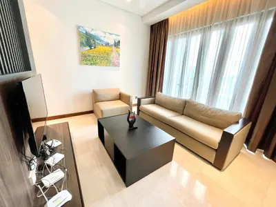 a living room with a couch and a coffee table at KLCC Luxury Condo Damai 88 Near Gleneagles Hospital in Kuala Lumpur
