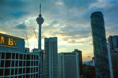 a view of a city with skyscrapers and a tower at Soho Suites KLCC by Alucard\uff08\u5409\u9686\u5761KLCC Alucard Soho\u5957\u623f\u516c\u5bd3\uff09 in Kuala Lumpur