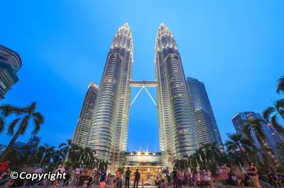 a view of the petronas twin towers at dusk at Perfect Location#2 @Heart of KL City Centre next to Metro MRT in Kuala Lumpur