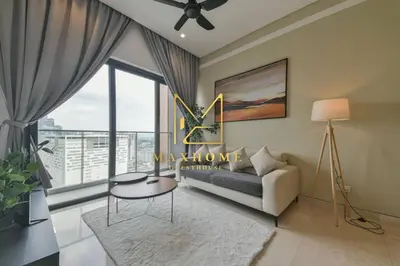 a living room with a couch and a large window at Maxhome at Lucentia Bukit Bintang City centre KL in Kuala Lumpur