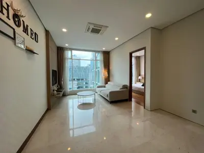 a living room with a couch and a table at Soho Suites KLCC in Kuala Lumpur