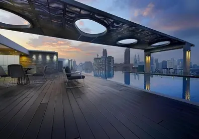 a balcony of a building with a view of the city at Maxhome @ D'Majestic Place, KL City Centre in Kuala Lumpur