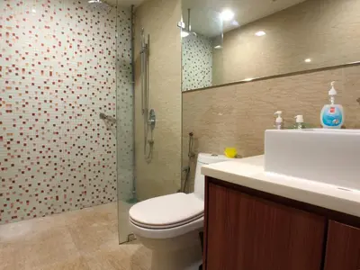 a bathroom with a toilet and a sink and a shower at ✦Time & Traveller✦Regalia Suites and Residence✦KLCC view Infinity Pool✦双子塔无边泳池 in Kuala Lumpur