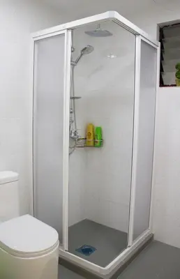 a shower stall in a bathroom with a toilet at The FORUM condominium, Jalan Inai, Off Jalan Tun Razak in Kuala Lumpur