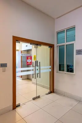 an entrance to a building with a glass door at Rex Ollie @ 231 TR Suite in Kuala Lumpur