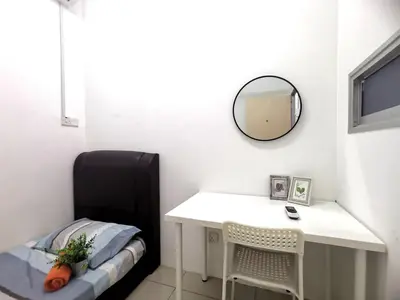 a small room with a desk and a mirror at PV21 Setapak, Share House Room Only in Kuala Lumpur