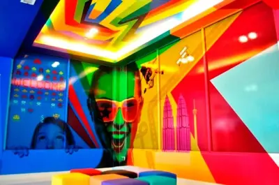 a colorful room with a skull and a child at YY318 Hotel Bukit Bintang in Kuala Lumpur
