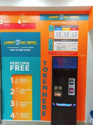 an orange vending machine in a store at Sky Hotel @ Pudu in Kuala Lumpur