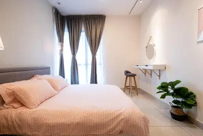 a bedroom with a bed and a large window at 3 Rooms Elegant Minimalist Design Setapak 15min KLCC in Kuala Lumpur