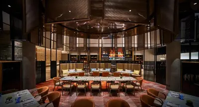 a large dining room with a table and chairs at EQ Kuala Lumpur in Kuala Lumpur