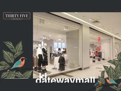 a clothing store with a colorful bird on the window at KL Gateway Premium Residence - Easy LRT Access in Kuala Lumpur