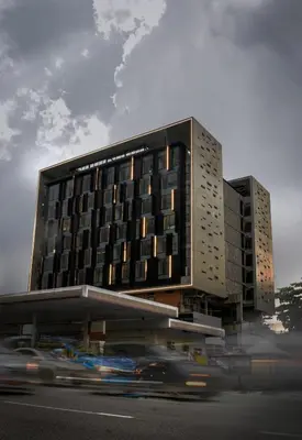 a rendering of a building with cars in front of it at KLoe Hotel in Kuala Lumpur