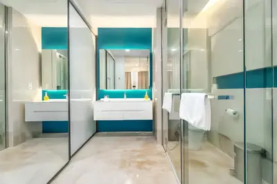 a bathroom with a sink and a mirror at Tropicana The Residence KLCC in Kuala Lumpur