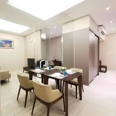 a dining room with a table and chairs at SKY POOL Luxury Suite 2-4Pax at KL City in Kuala Lumpur