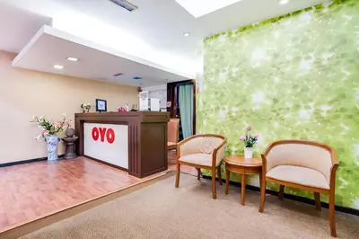 a waiting room with chairs and a podium at OYO 89652 Bjorn Boutique Hotel in Kuala Lumpur