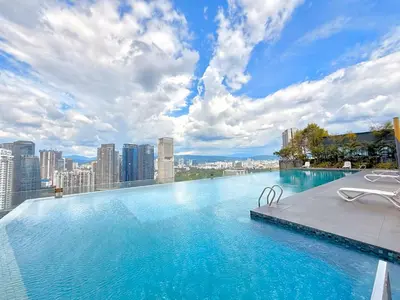 a swimming pool on the roof of a building at Dorsett Residences Bukit Bintang in Kuala Lumpur