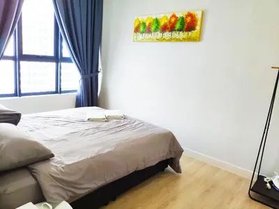 a bedroom with a bed and a painting on the wall at Arte Plus - Family Suite, 5 pax, Jalan Ampang in Kuala Lumpur