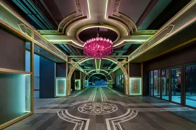 a hallway of a building with a chandelier at Arte Plus - Family Suite, 5 pax, Jalan Ampang in Kuala Lumpur