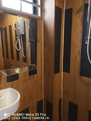 a bathroom with a sink and a mirror at Yeob Bay hotel Ampang in Ampang