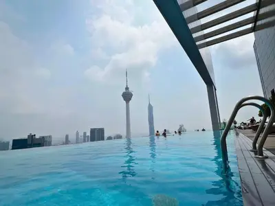 a swimming pool on the roof of a building with a view of the korean at La Platinum KLCC in Kuala Lumpur