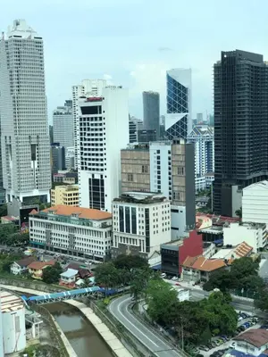 a city skyline with buildings and a river at La Platinum KLCC in Kuala Lumpur