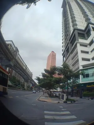 a city street with tall buildings and a street with cars at VUE RESIDENCE SERVICE SUITE- 2 ROOMS SIZE 500SFT 4 pax in Kuala Lumpur