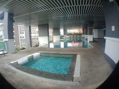 a large pool in the middle of a building at VUE RESIDENCES Jln Pahang, KL city - 2 ROOM - 4 pax in Kuala Lumpur