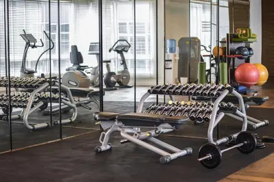 a gym with several rows of exercise bikes at Lanson Place Bukit Ceylon in Kuala Lumpur