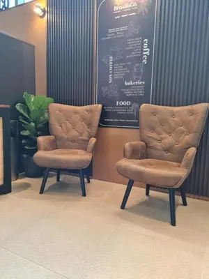 two chairs sitting next to each other in a room at Cozy Studio 10min to KLCC next to Hospital Gleneagle Jalan Ampang in Kuala Lumpur