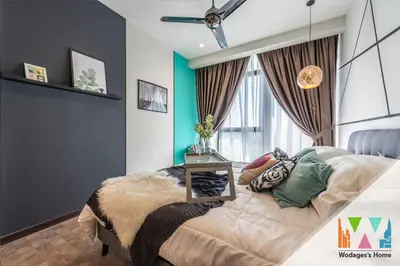 a bedroom with a bed and a window at KLCC Expressionz by WGS in Kuala Lumpur