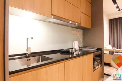 a kitchen with a sink and a counter top at KLCC Expressionz by WGS in Kuala Lumpur