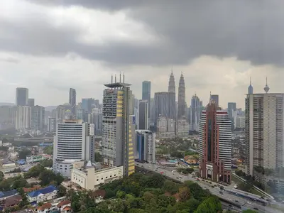 a view of a city skyline with tall buildings at ExpressionZ Suites KLCC in Kuala Lumpur