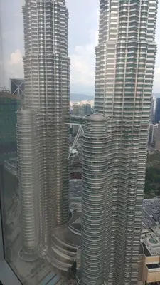 a group of tall buildings in a city at Tropicana The Residences KLCC by Vale Pine in Kuala Lumpur