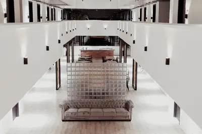 an empty hall with a couch in the middle at Urban Living Residence in Kuala Lumpur