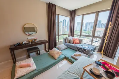 a living room with a couch and a large window at Dorsett Residences Sri Hartamas [5 Star Suites] in Kuala Lumpur