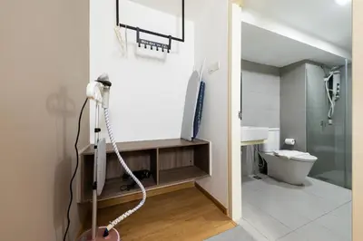 a bathroom with a shower and a sink and a toilet at Eko Cheras By Sleepy Bear in Kuala Lumpur