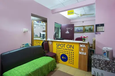 a waiting room with a stop on sign and a bench at Hotel O Perfect Class Hotel in Kuala Lumpur