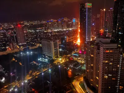 an aerial view of a city at night at Luxe Suites at Vortex KLCC in Kuala Lumpur