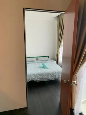 a mirror reflection of a bedroom with a bed in a room at 2 bedroom apartment at 28 Boulavard in Kuala Lumpur