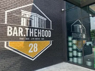 a mural on the side of a building with a bar thehood at 2 bedroom apartment at 28 Boulavard in Kuala Lumpur